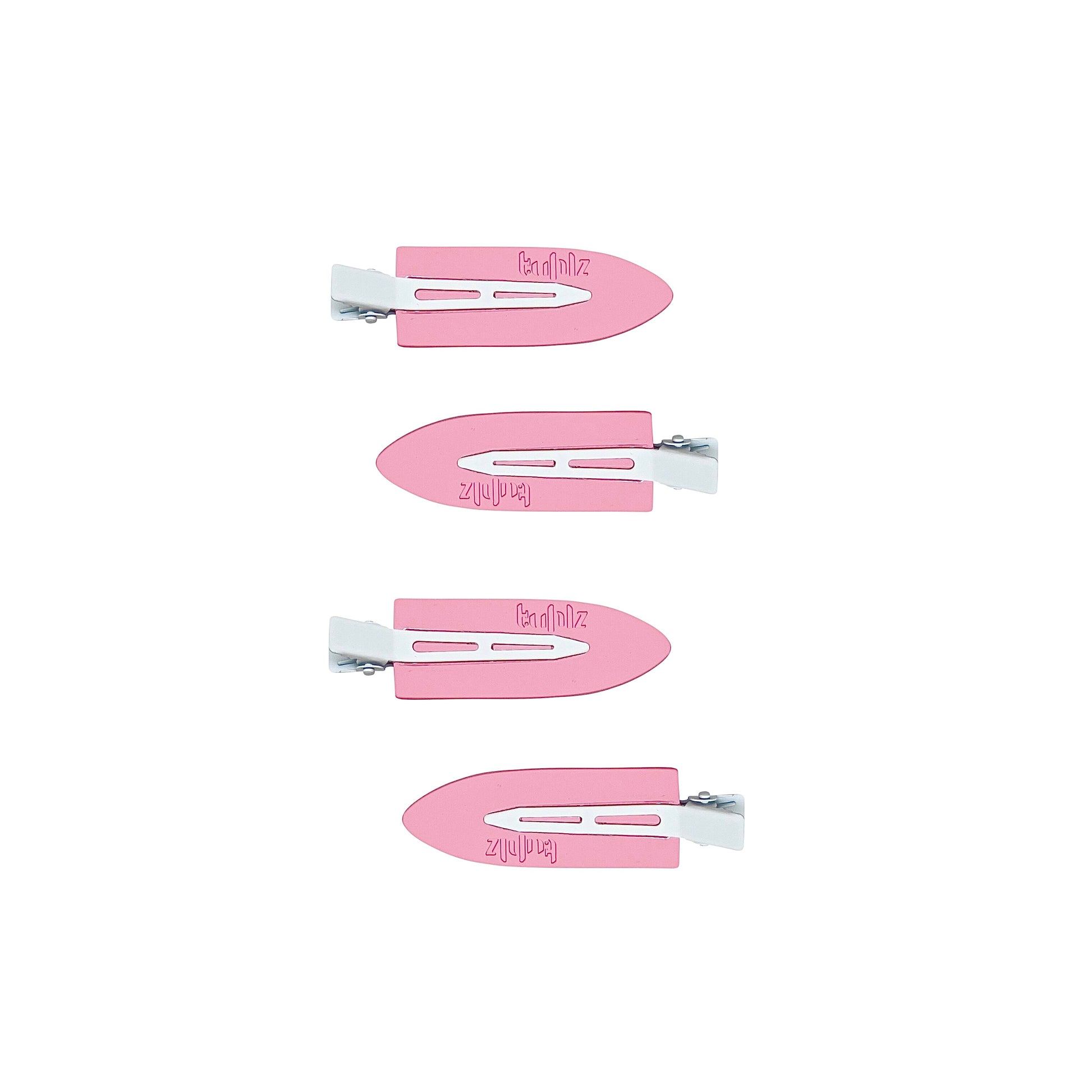 Four pink hair clips of varying sizes displayed in front of a transparent storage case with a white label.