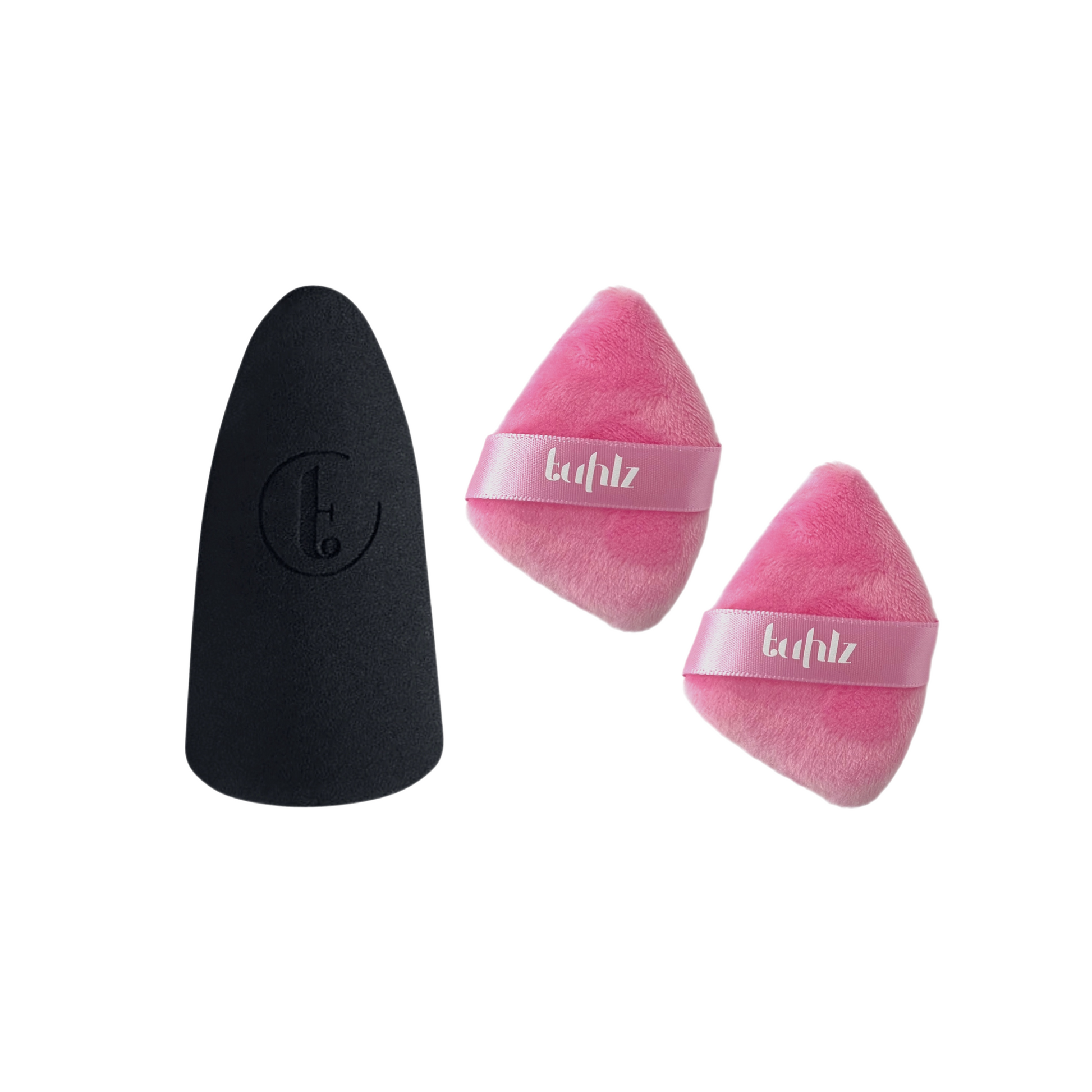 The image shows a black abstract sponge on the left and two pink luxe powder puffs with the brand name 'tuhiz' on them on the right.
